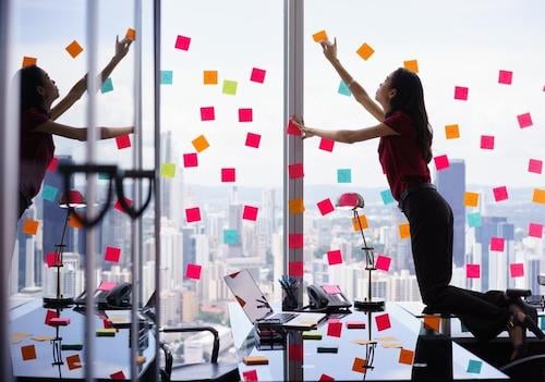 overwhelmed-employee-post-its.jpg